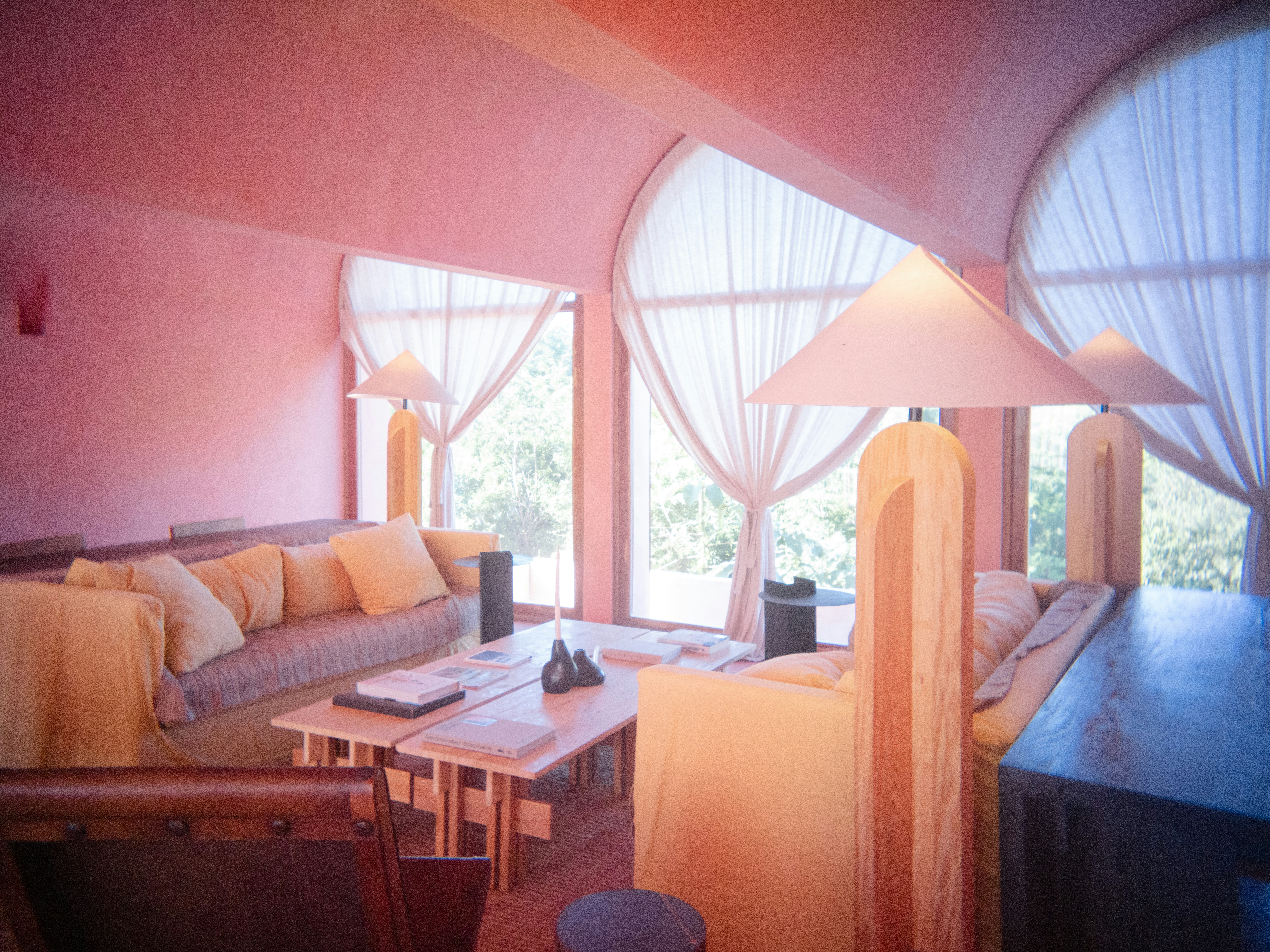 living room with vibrant, unfaded decor behind a tinted window - window tinting jacksonville beach