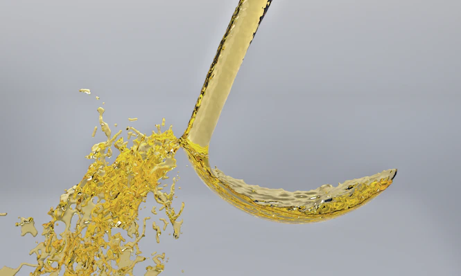 A yellow liquid pouring out of a yellow umbrella