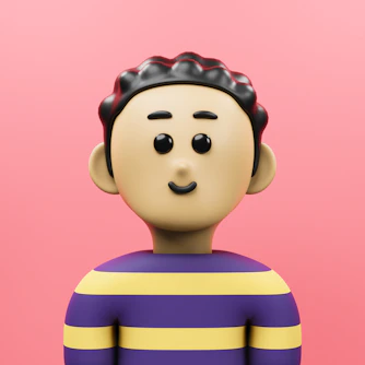 A small toy is standing in front of a pink background