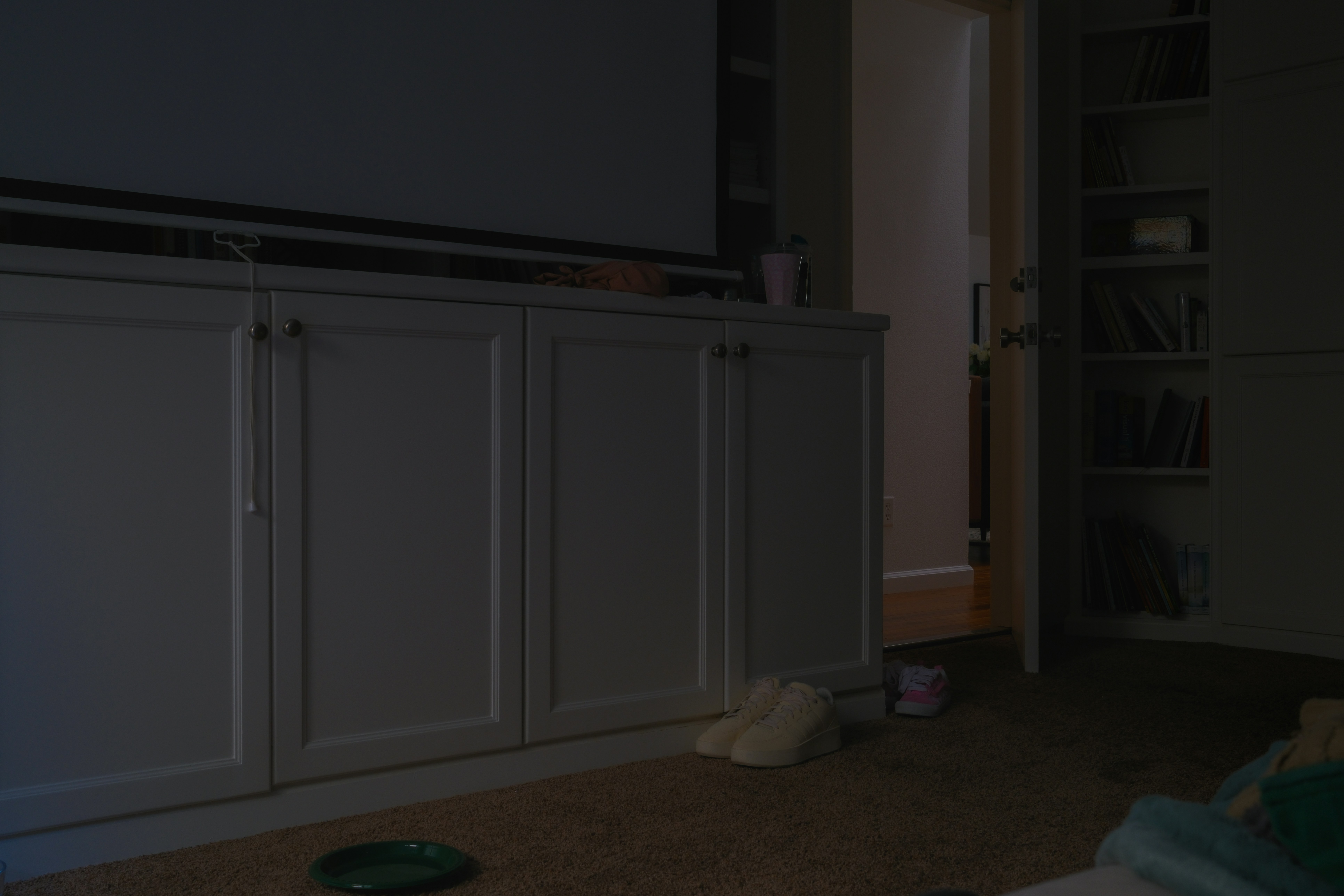 A living room filled with furniture and a flat screen TV