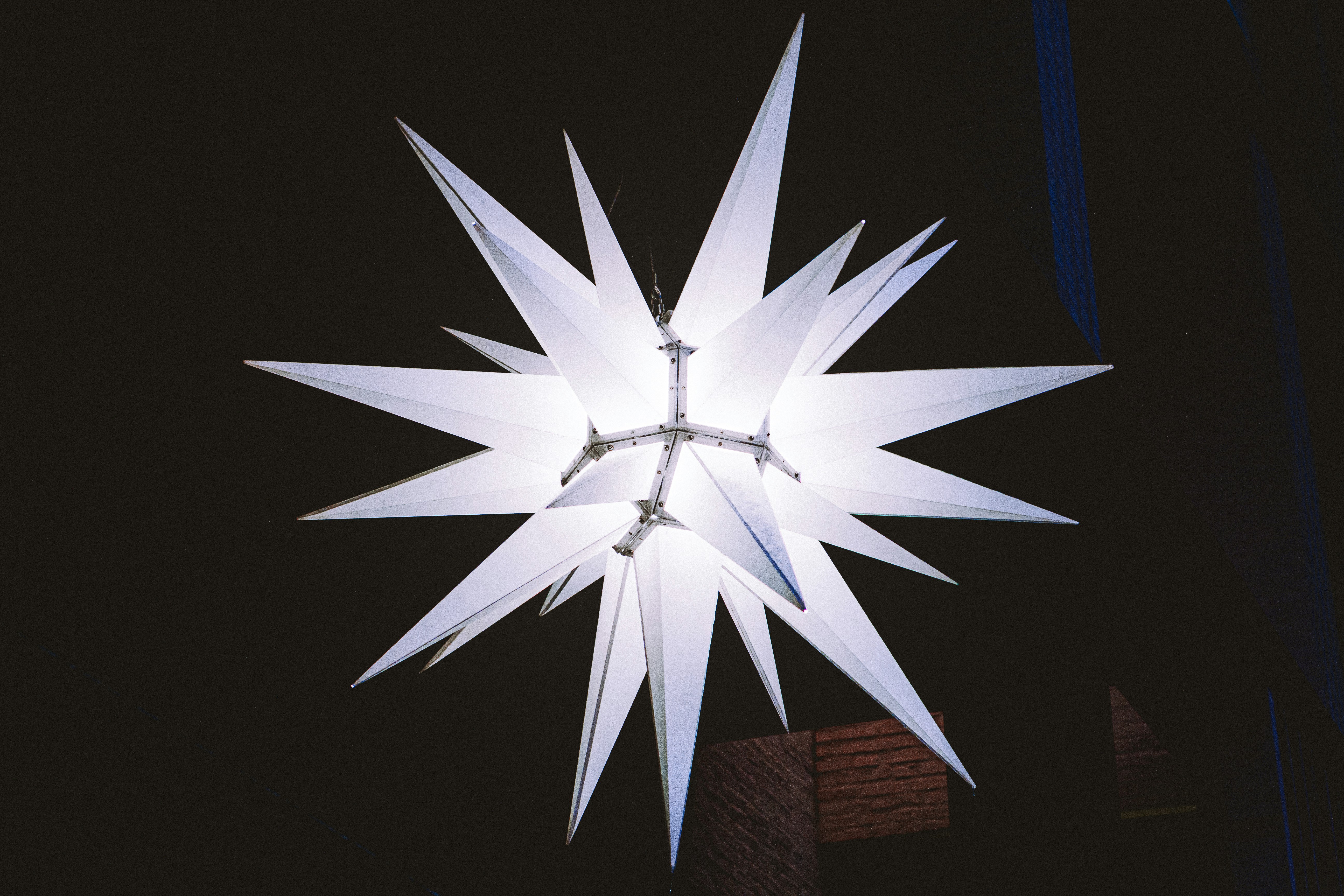 A large white star hanging from the ceiling