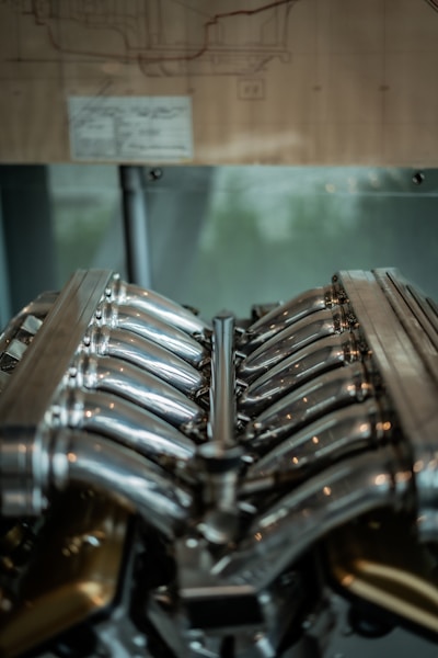 A close up of a motorcycle engine on display