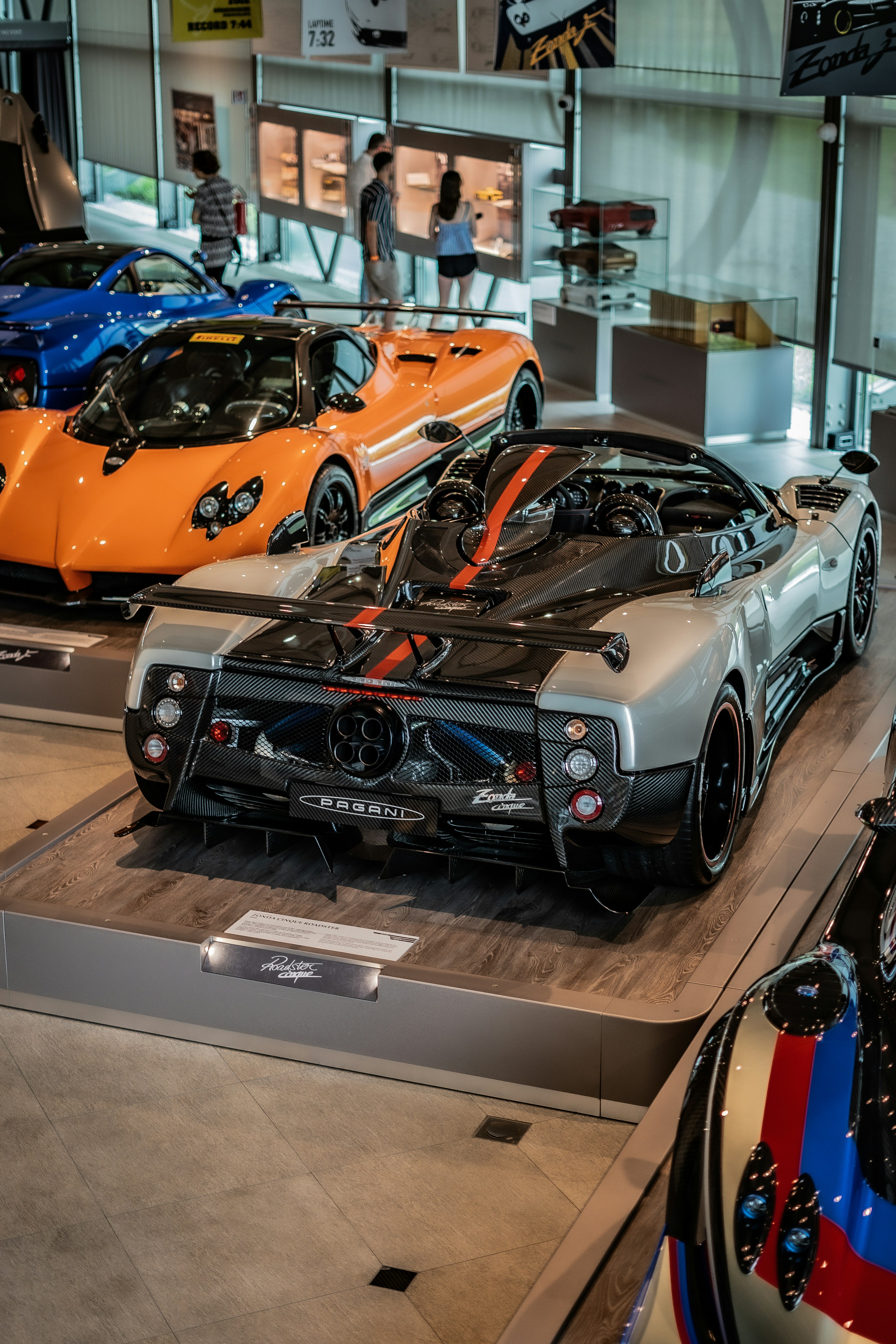 A bunch of cars that are on display