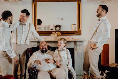 A group of men standing next to each other in a living room