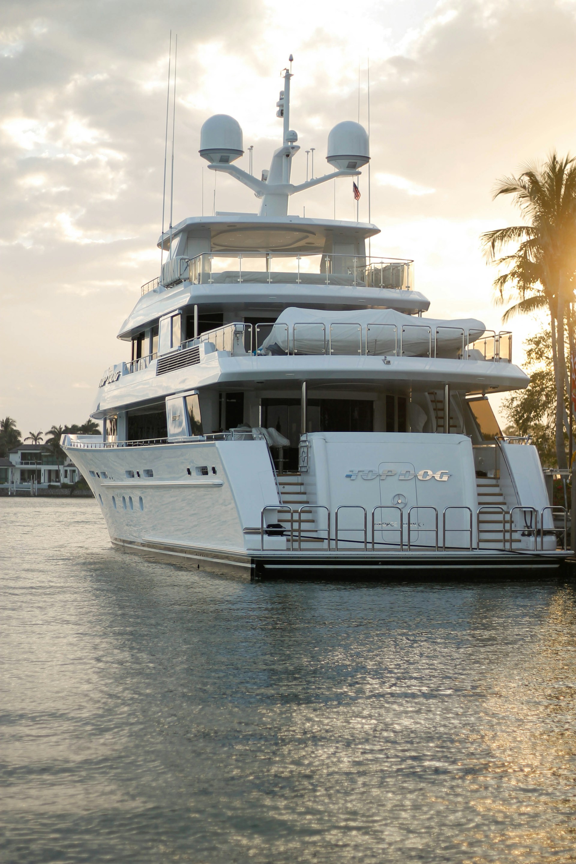 A large white boat floating on top of a body of water