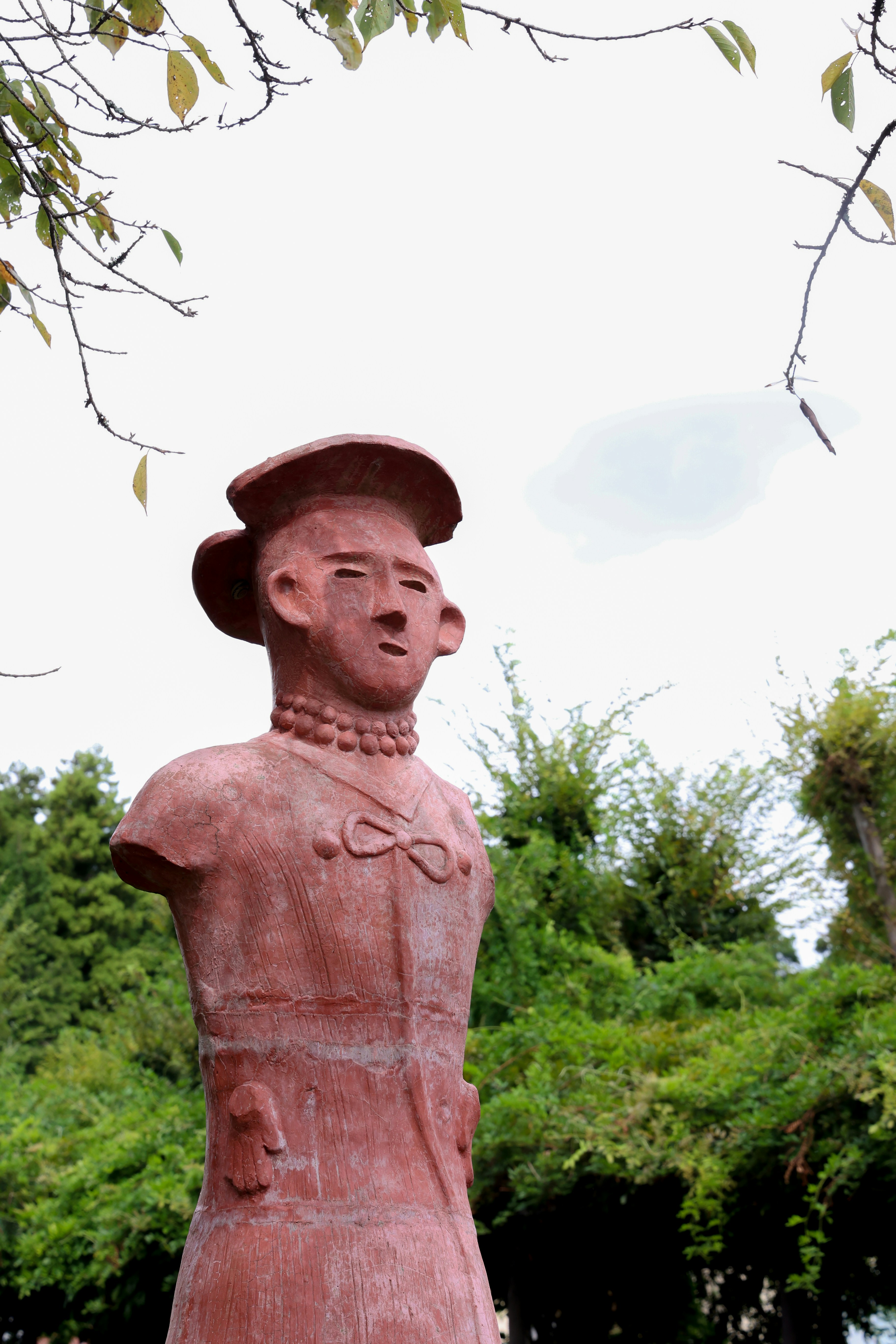 A statue of a man with a hat on