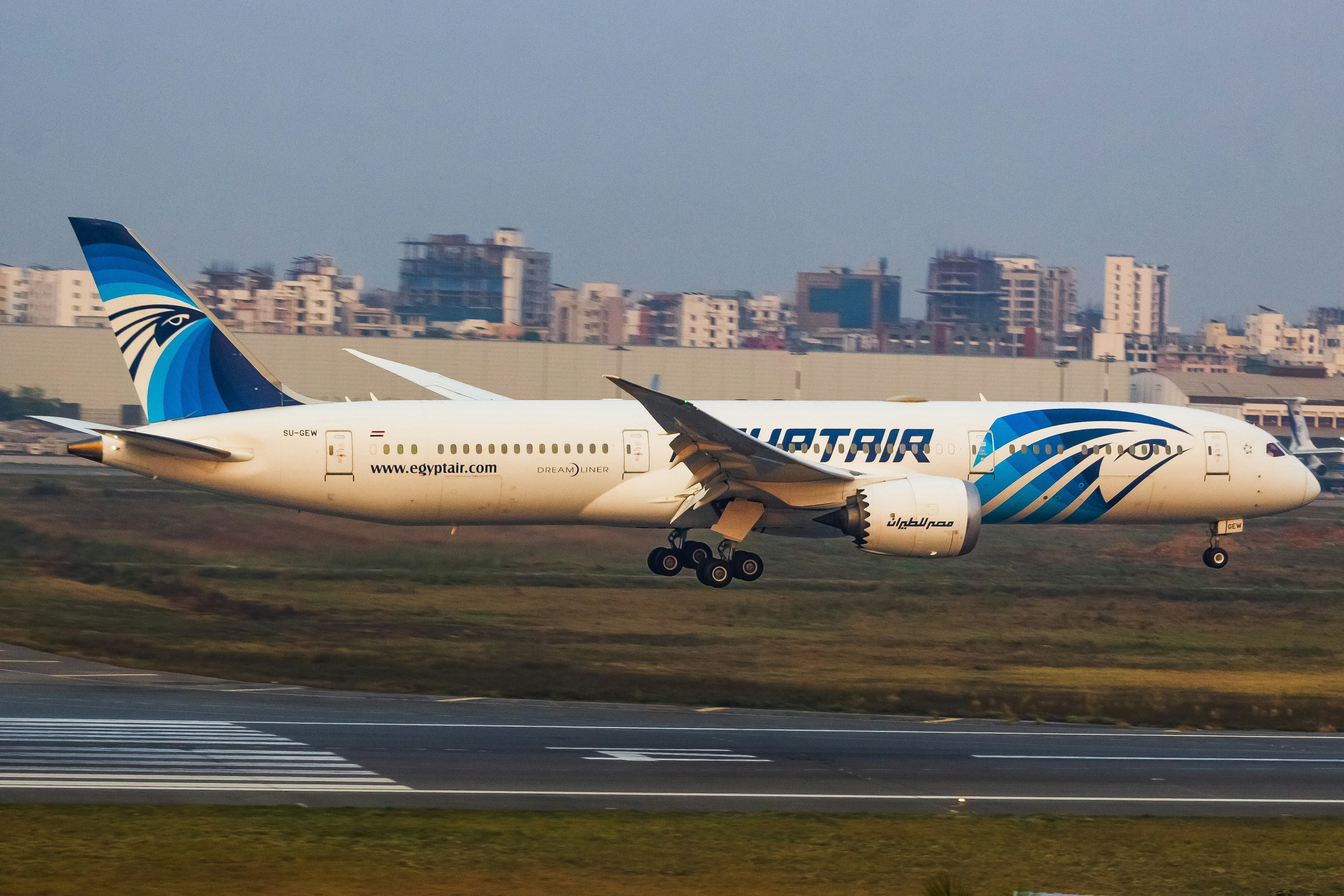 A large jetliner taking off from an airport runway