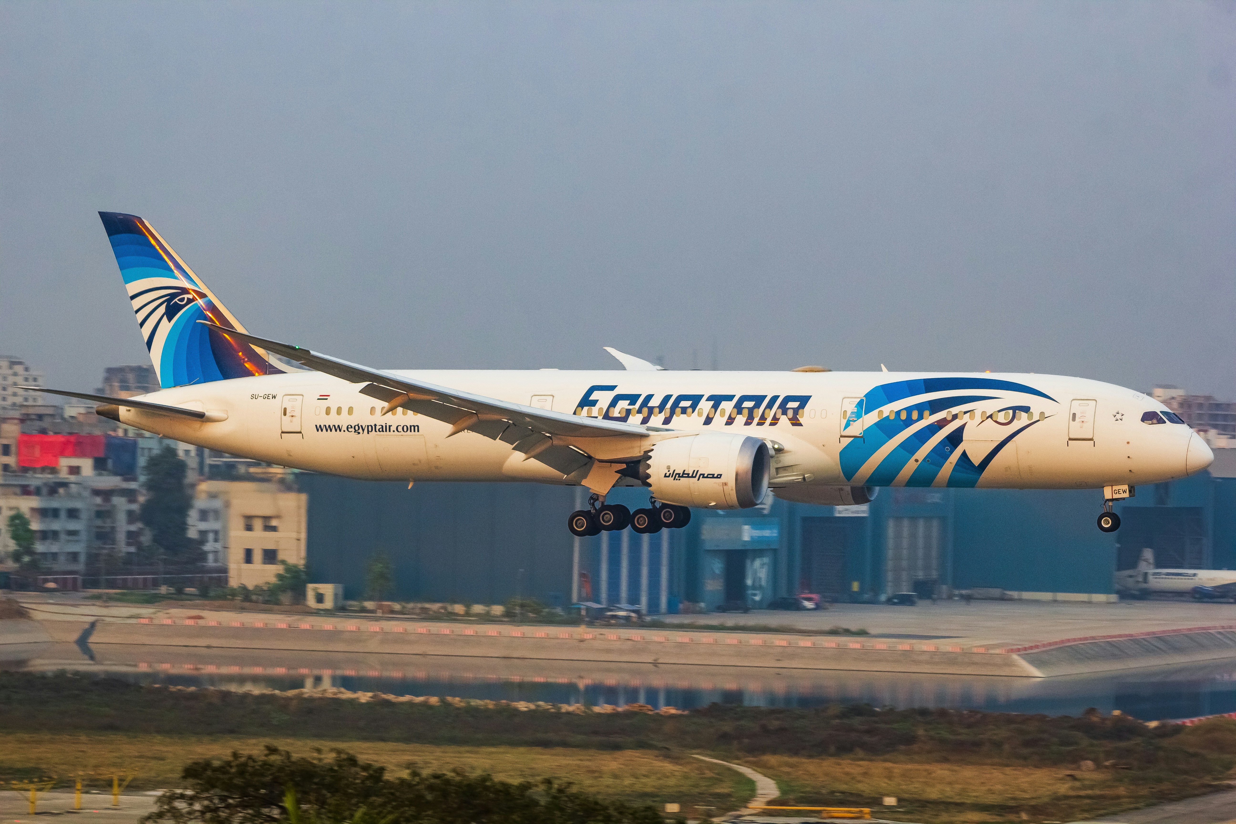 A large jetliner taking off from an airport runway