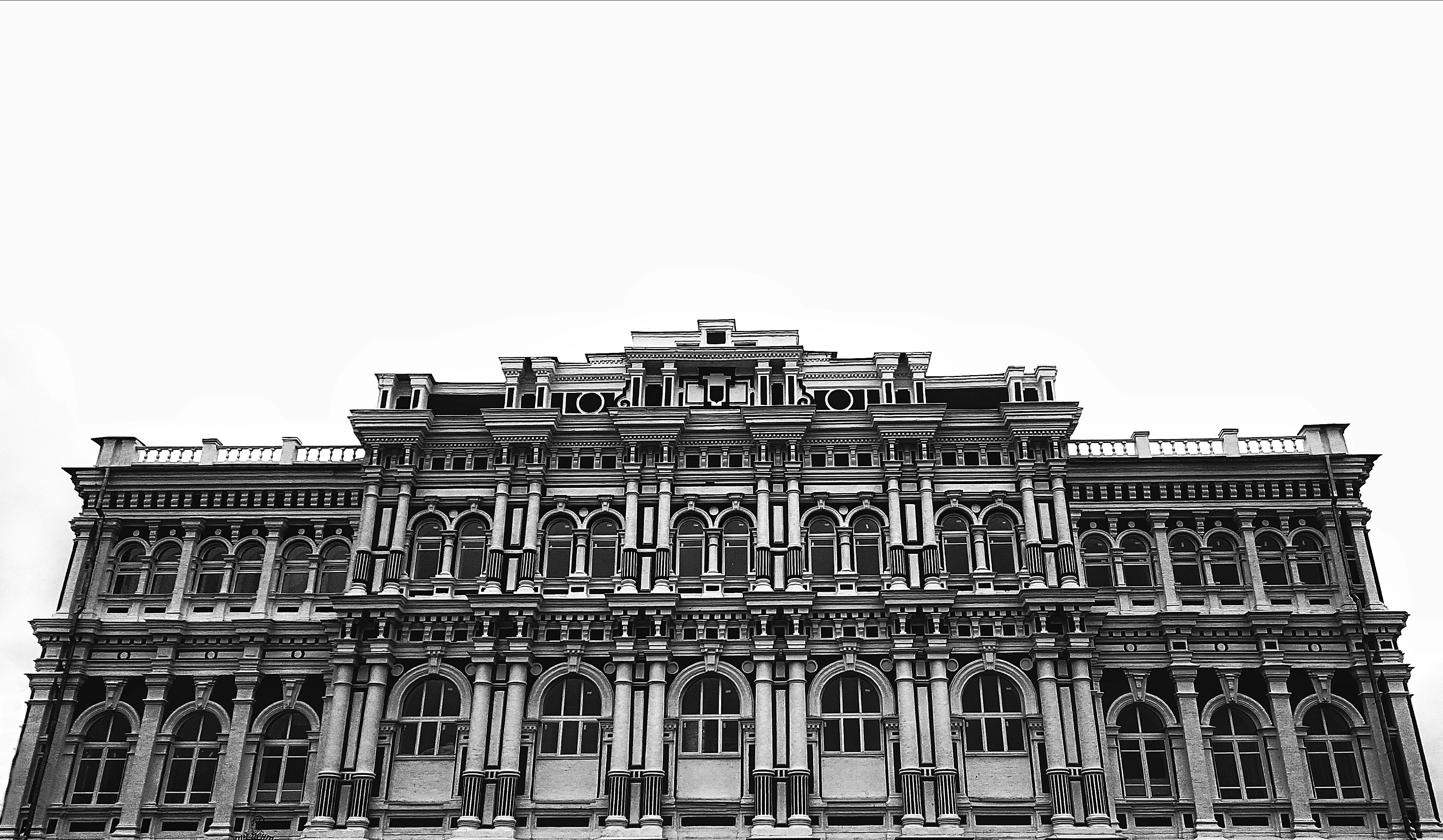A black and white photo of a large building