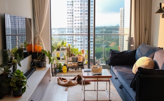 A living room filled with furniture and a flat screen TV