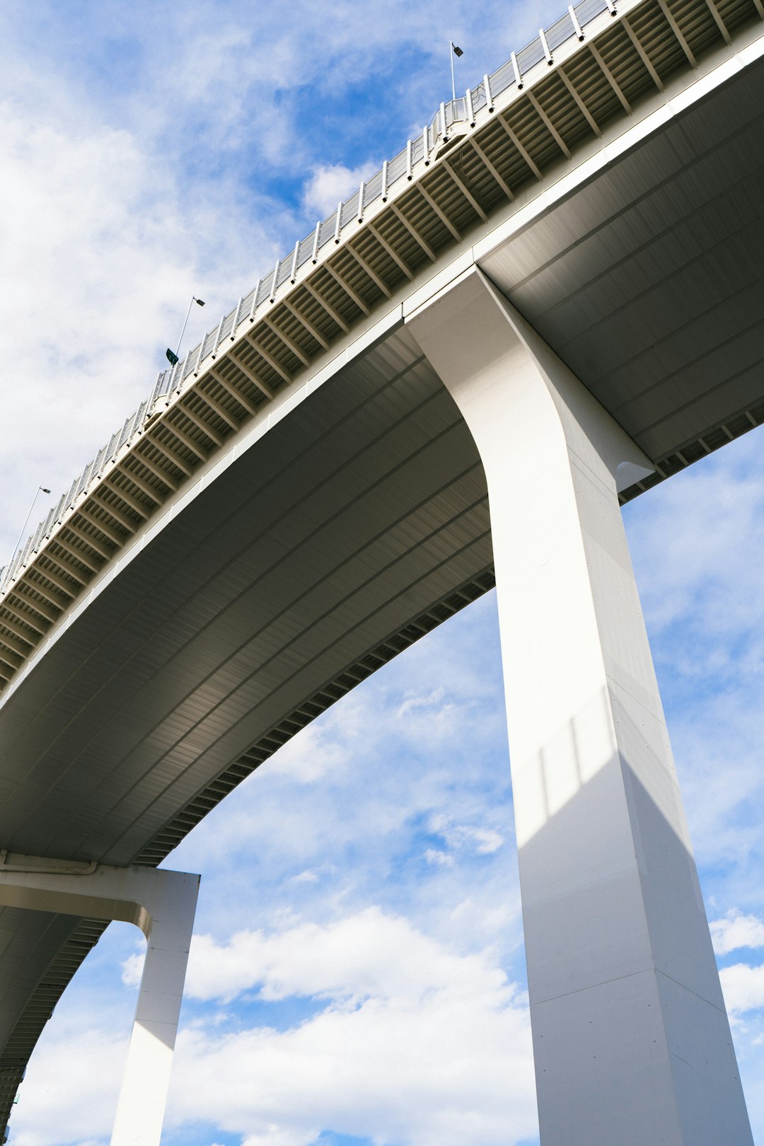 A tall bridge with a sky background
