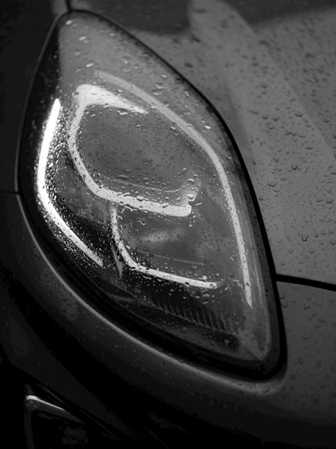 A close up of a car's side view mirror