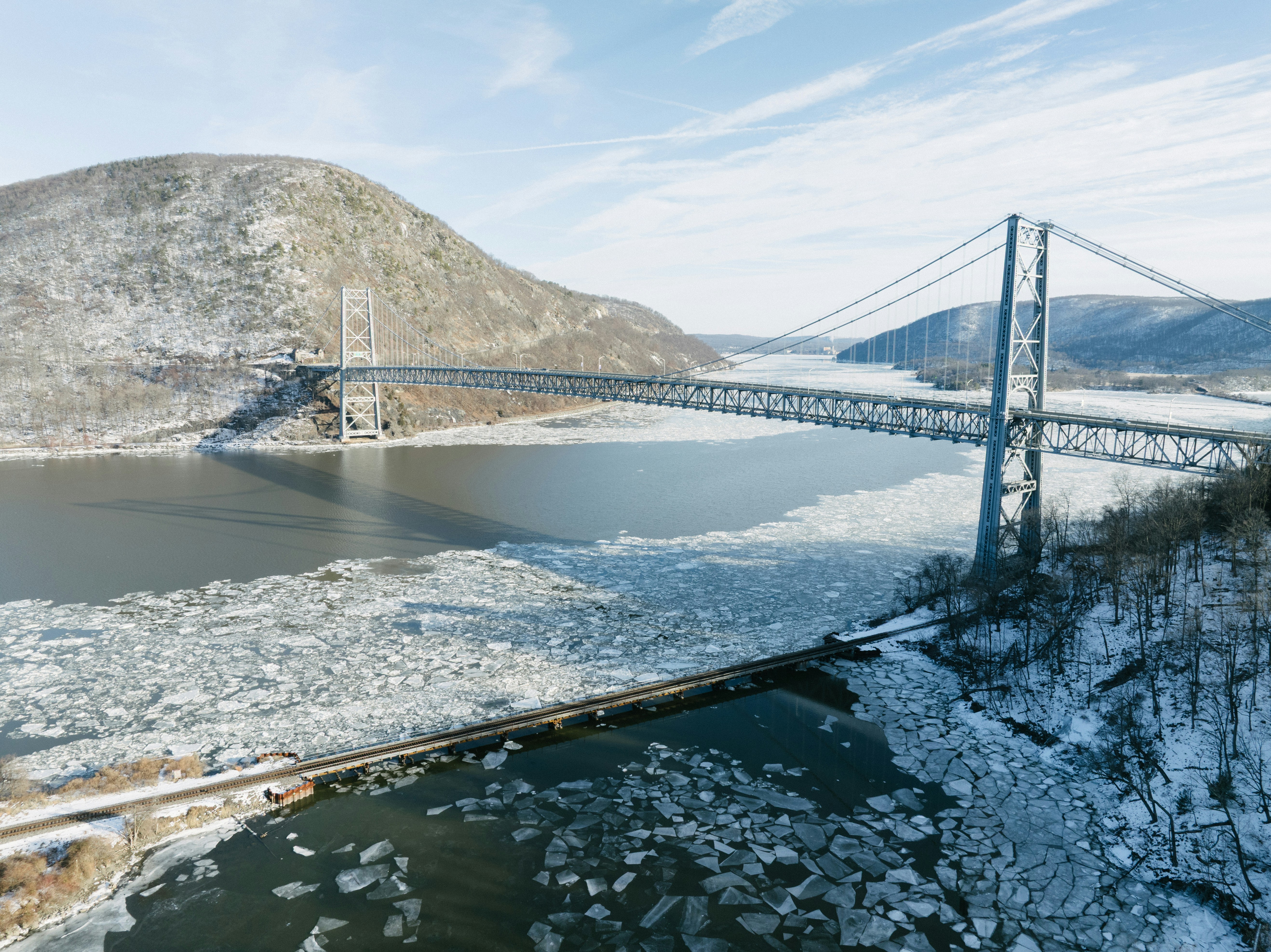 A large bridge over a large body of water