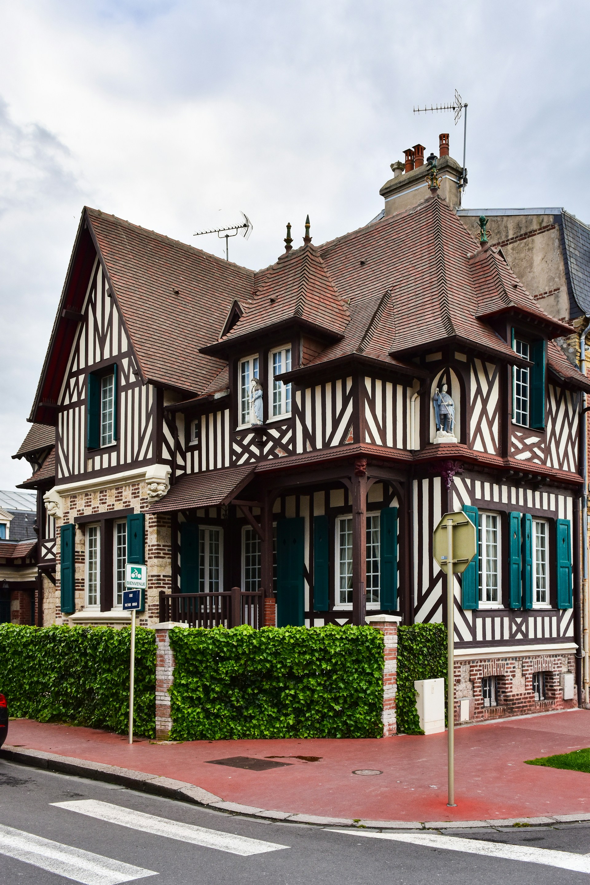 A car is parked in front of a house