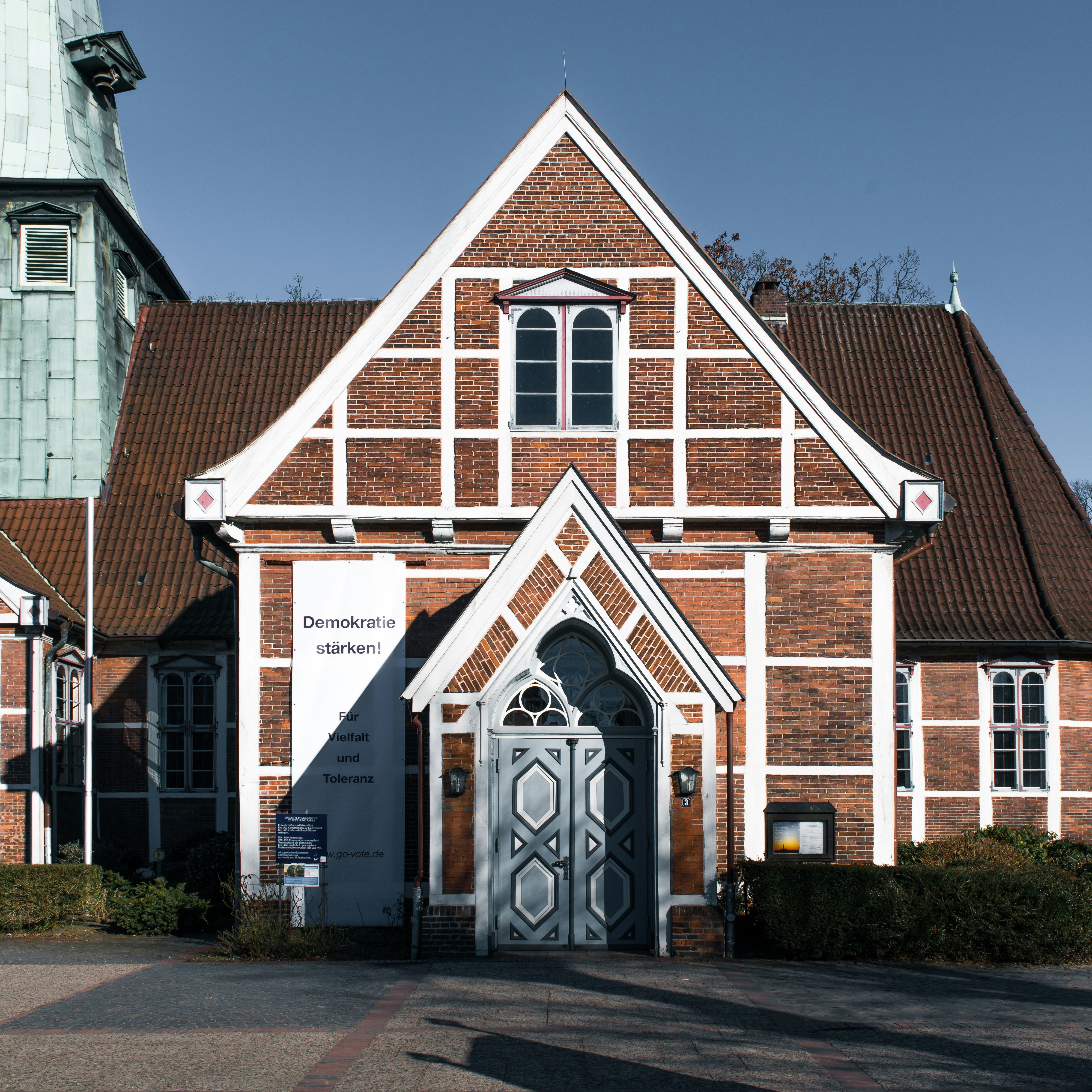 A church with a steeple and a clock tower