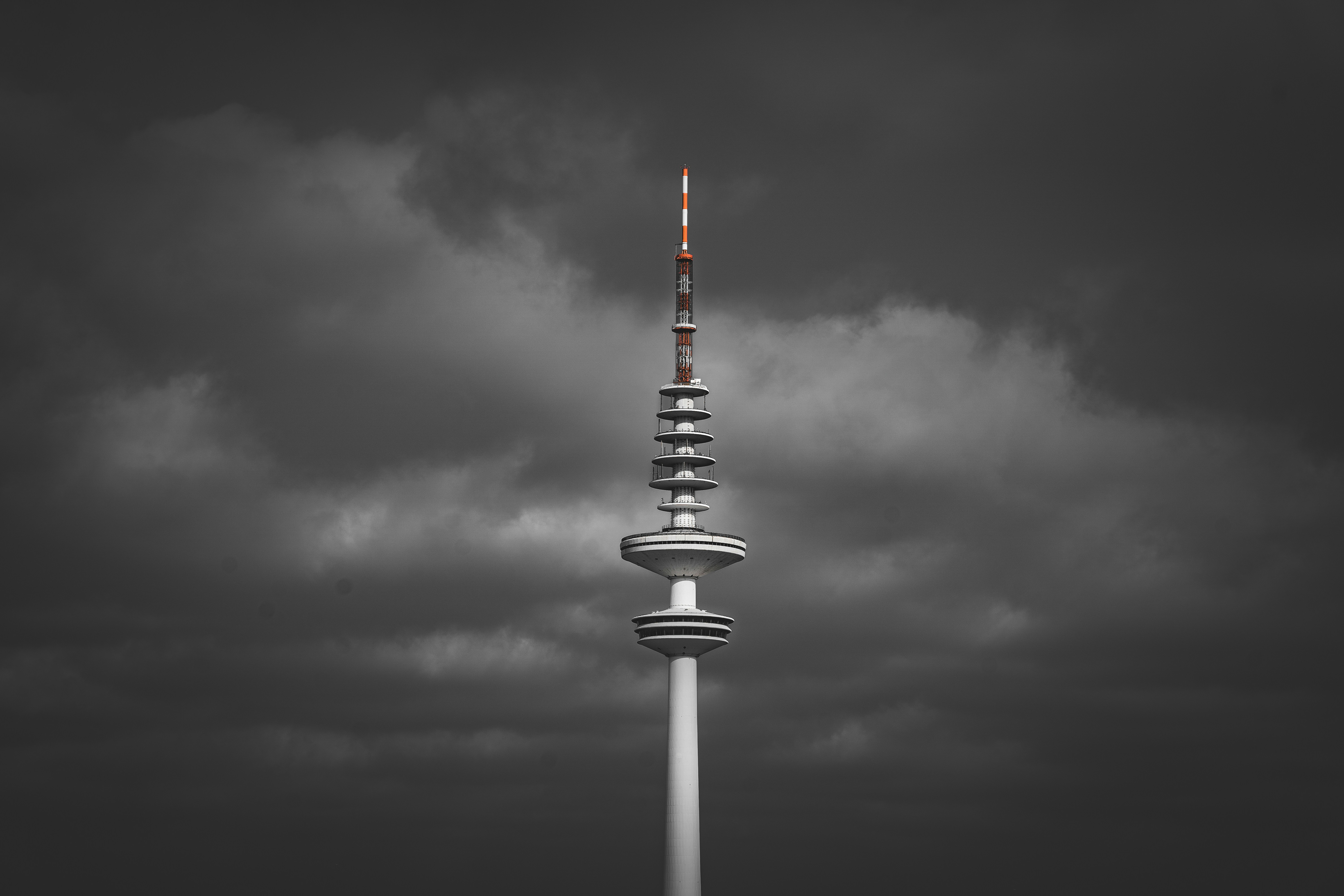 A black and white photo of a tall tower