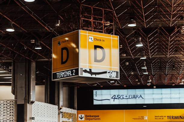 A building with a lot of signs hanging from the ceiling