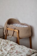 A bed with a basket on top of it