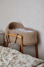 A bed with a basket on top of it