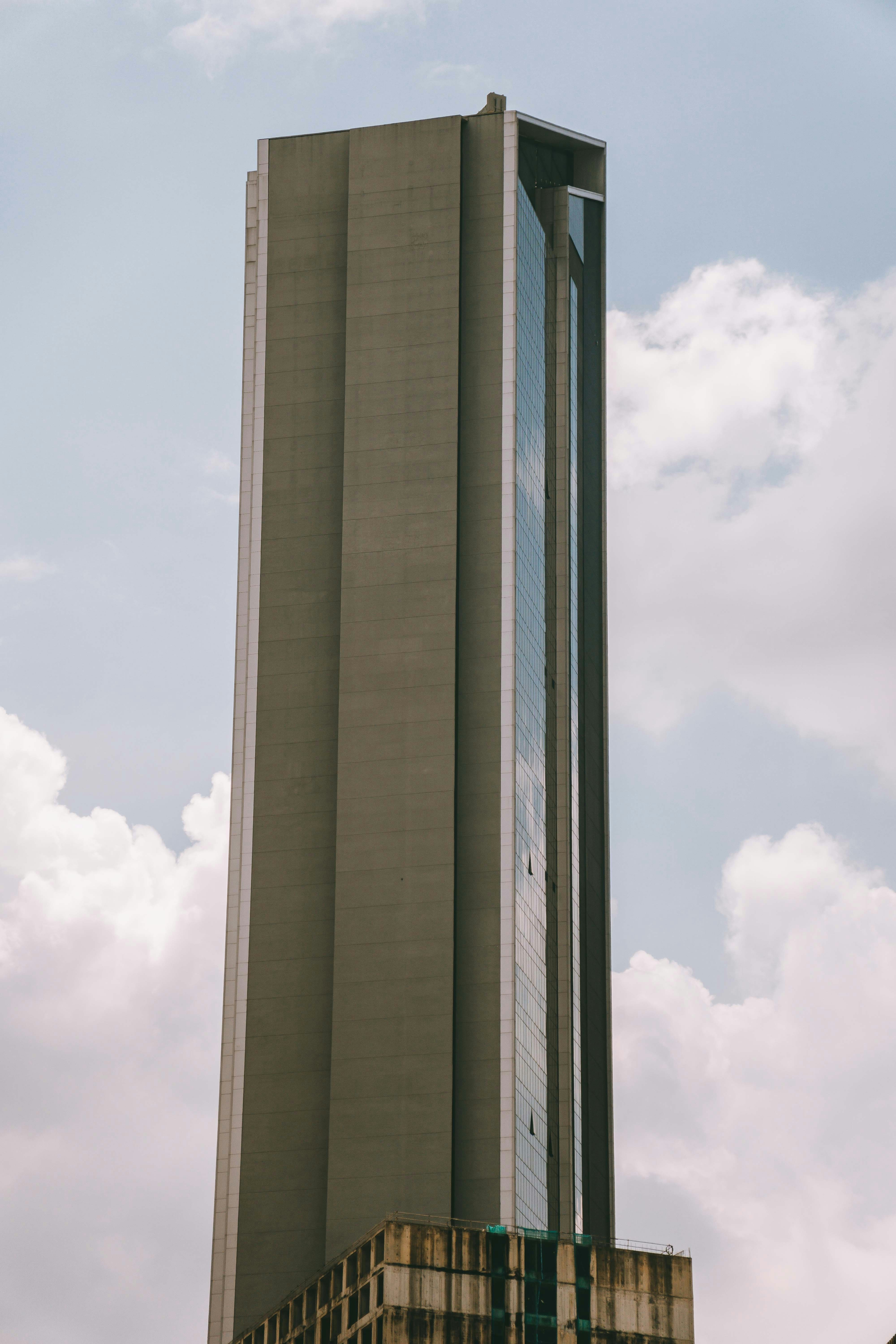A tall building with a clock on the side of it