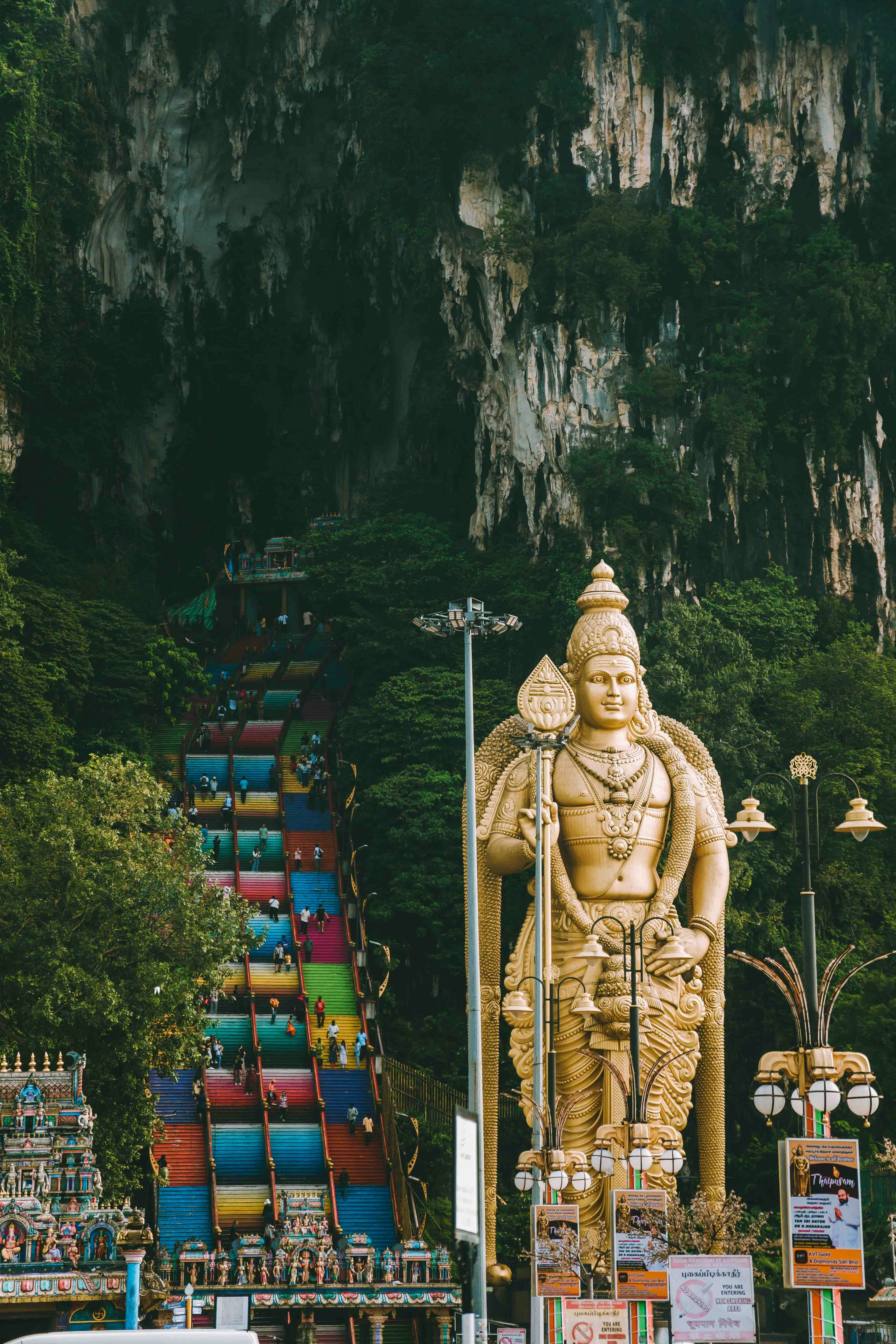 Batu Caves Hindu temple with colorful stairs and limestone formations