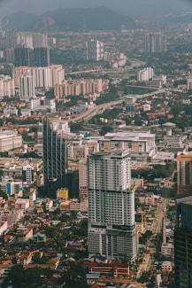 An aerial view of a city with tall buildings