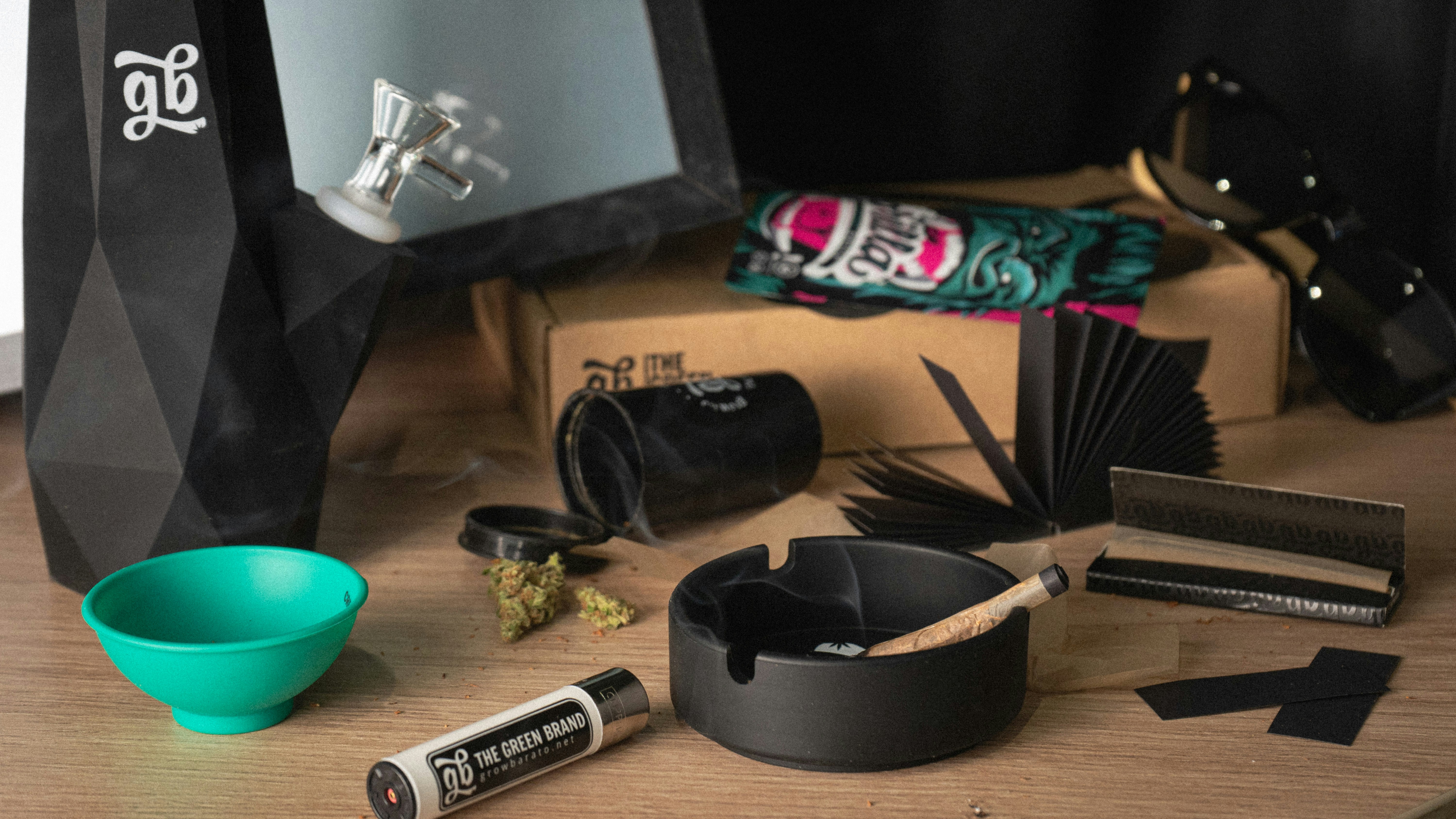 A table with a mirror, scissors and other items on it