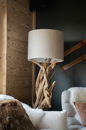 A living room filled with furniture and a lamp