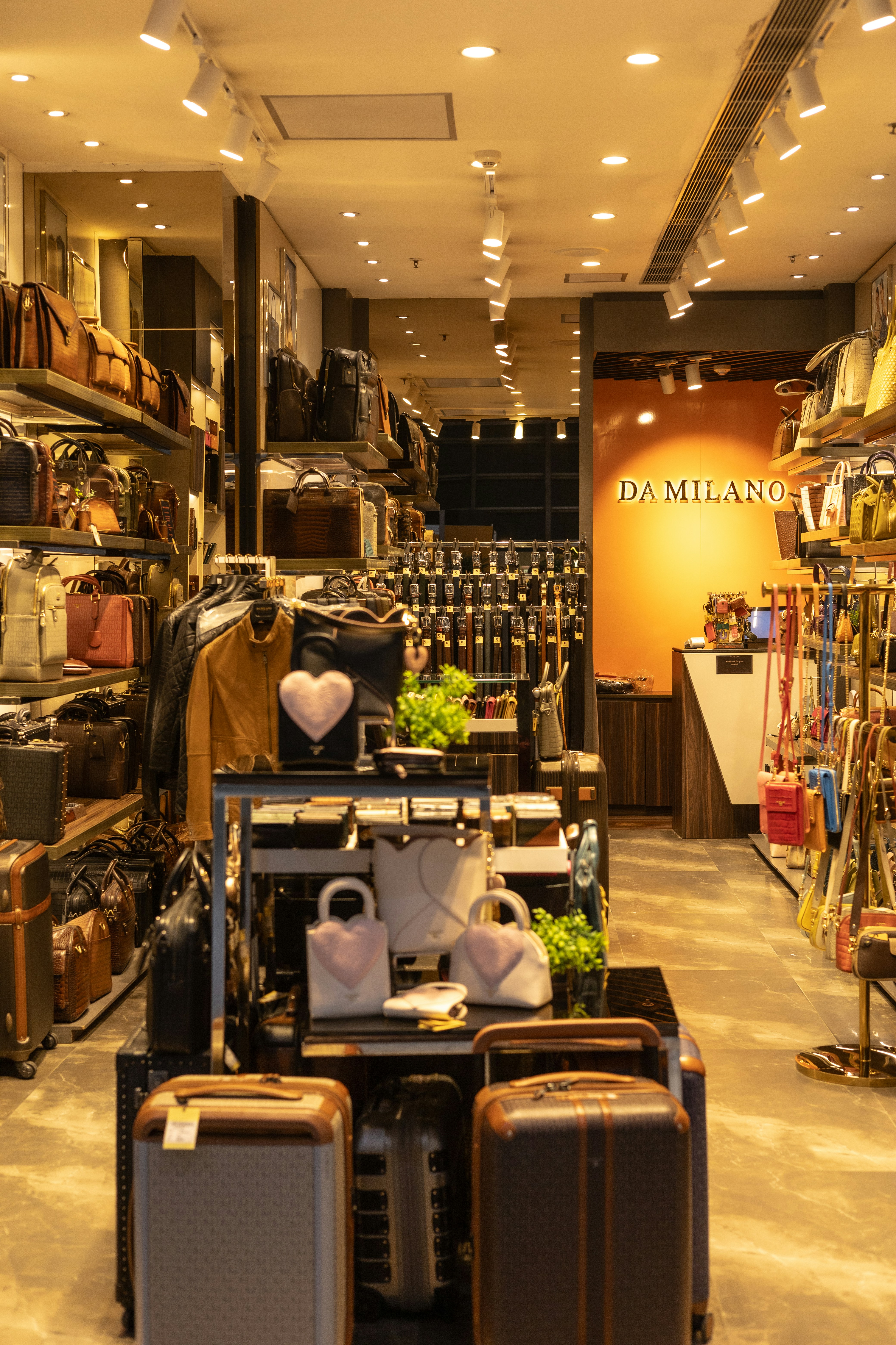 A store filled with lots of luggage and furniture photo – Free Building ...