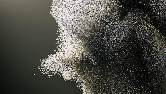 A close up of a person's face covered in white powder