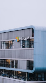 A tall building with a microsoft logo on it