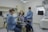 A group of people in a dental room