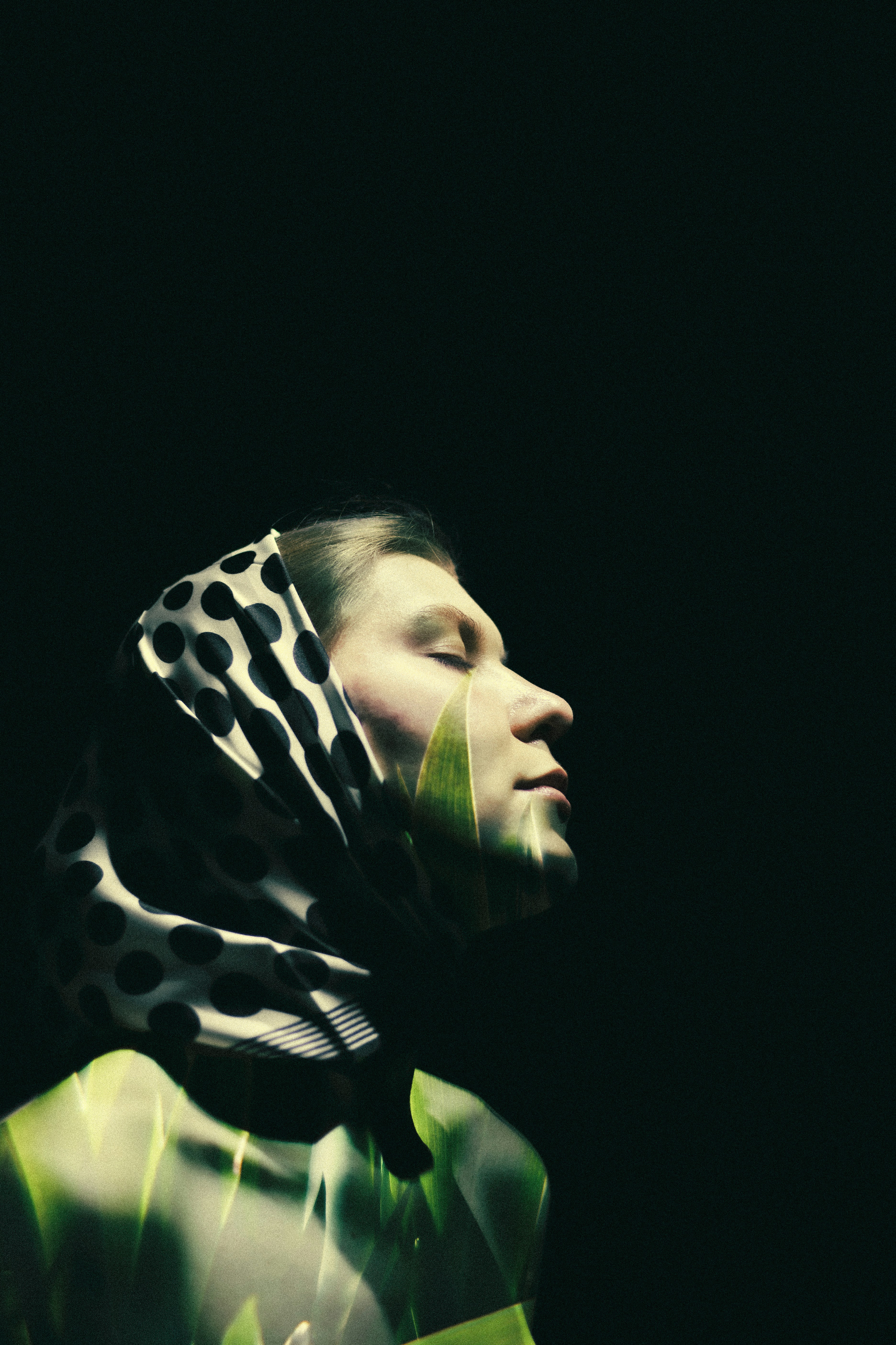 A man with a scarf around his head