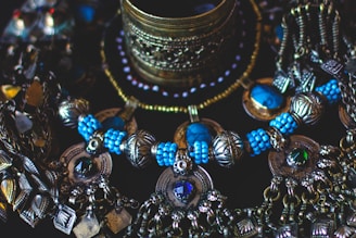 A bunch of necklaces that are on a table