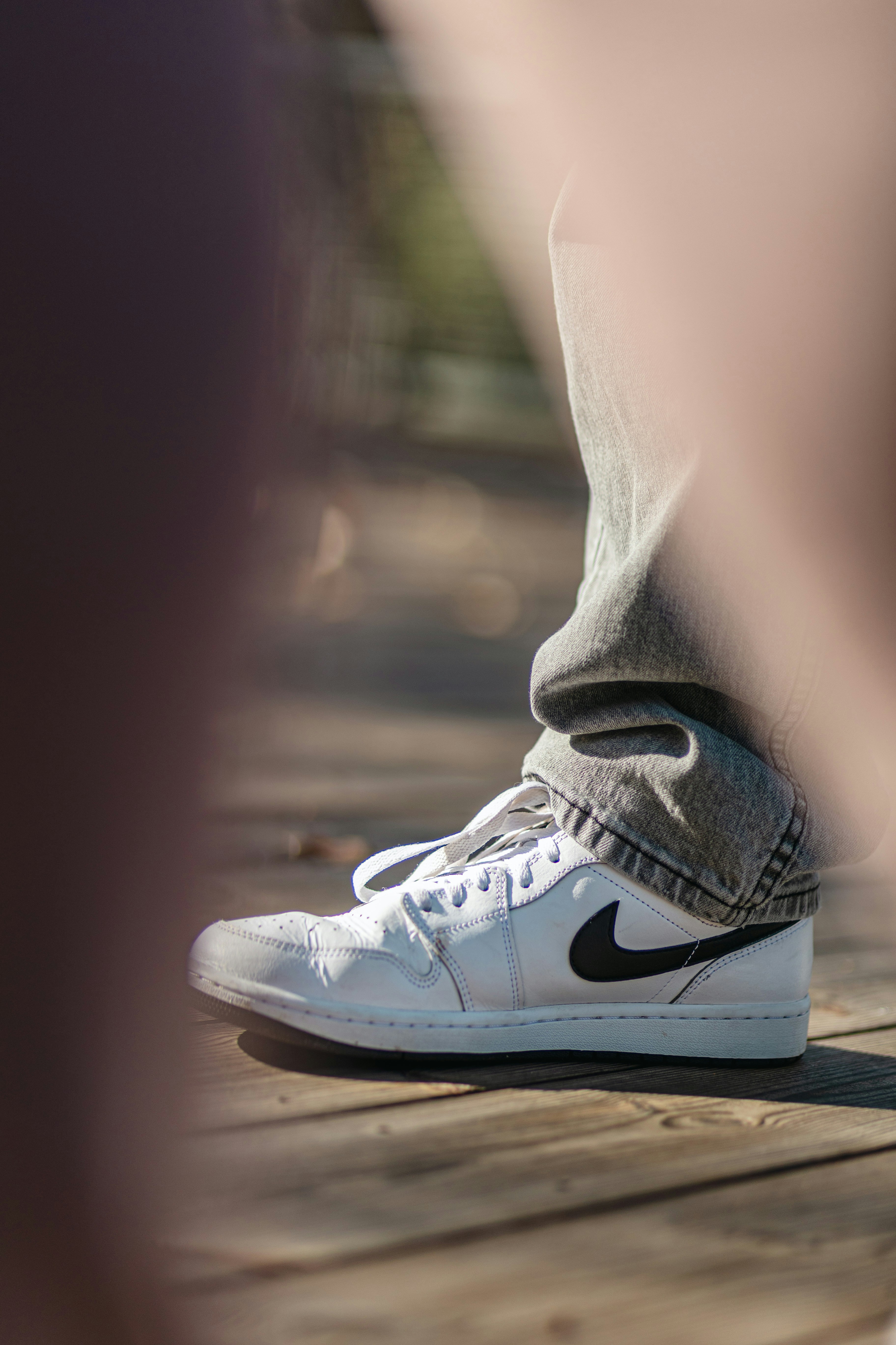 Casual sneakers on a wooden floor – everyday footwear