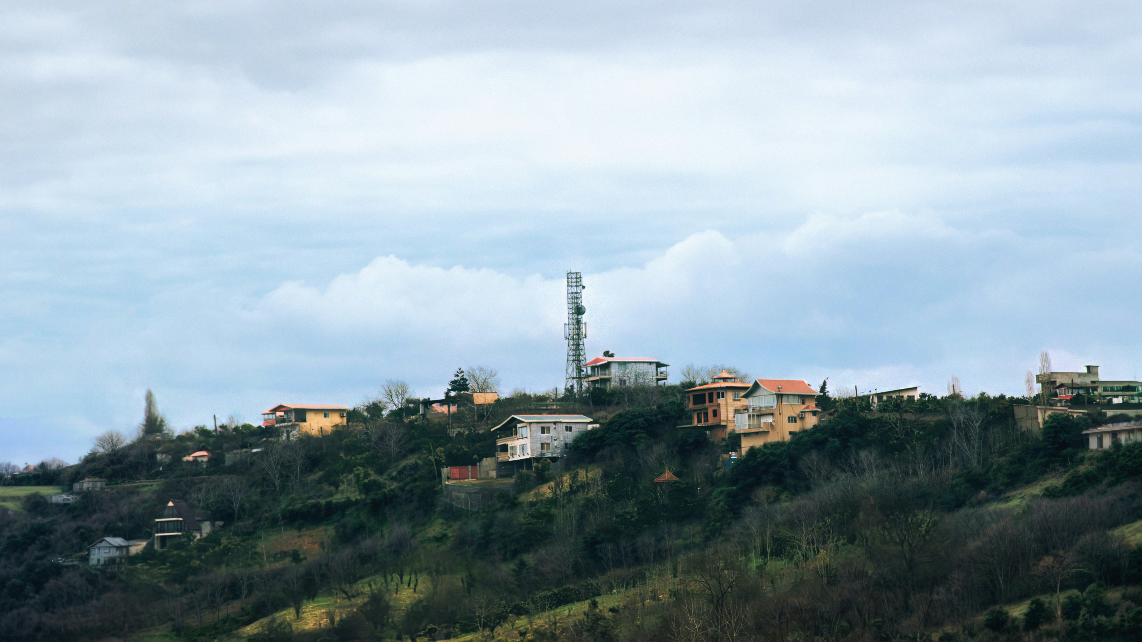 A hill with houses on top of it