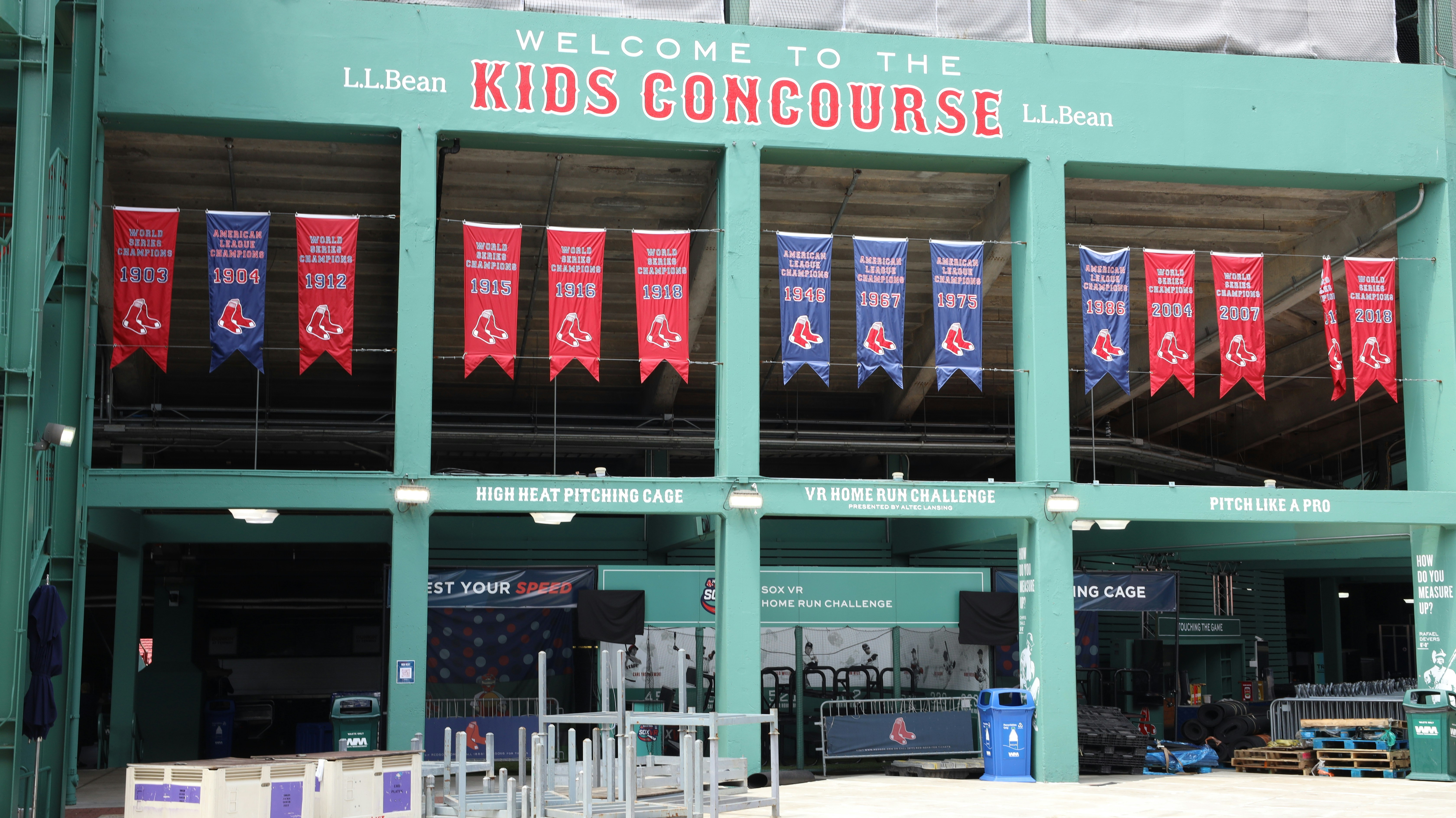 A baseball stadium with a large sign on the side of it
