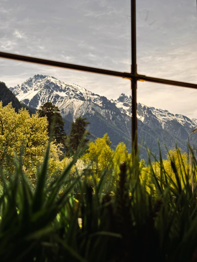 View of a mountain through a window