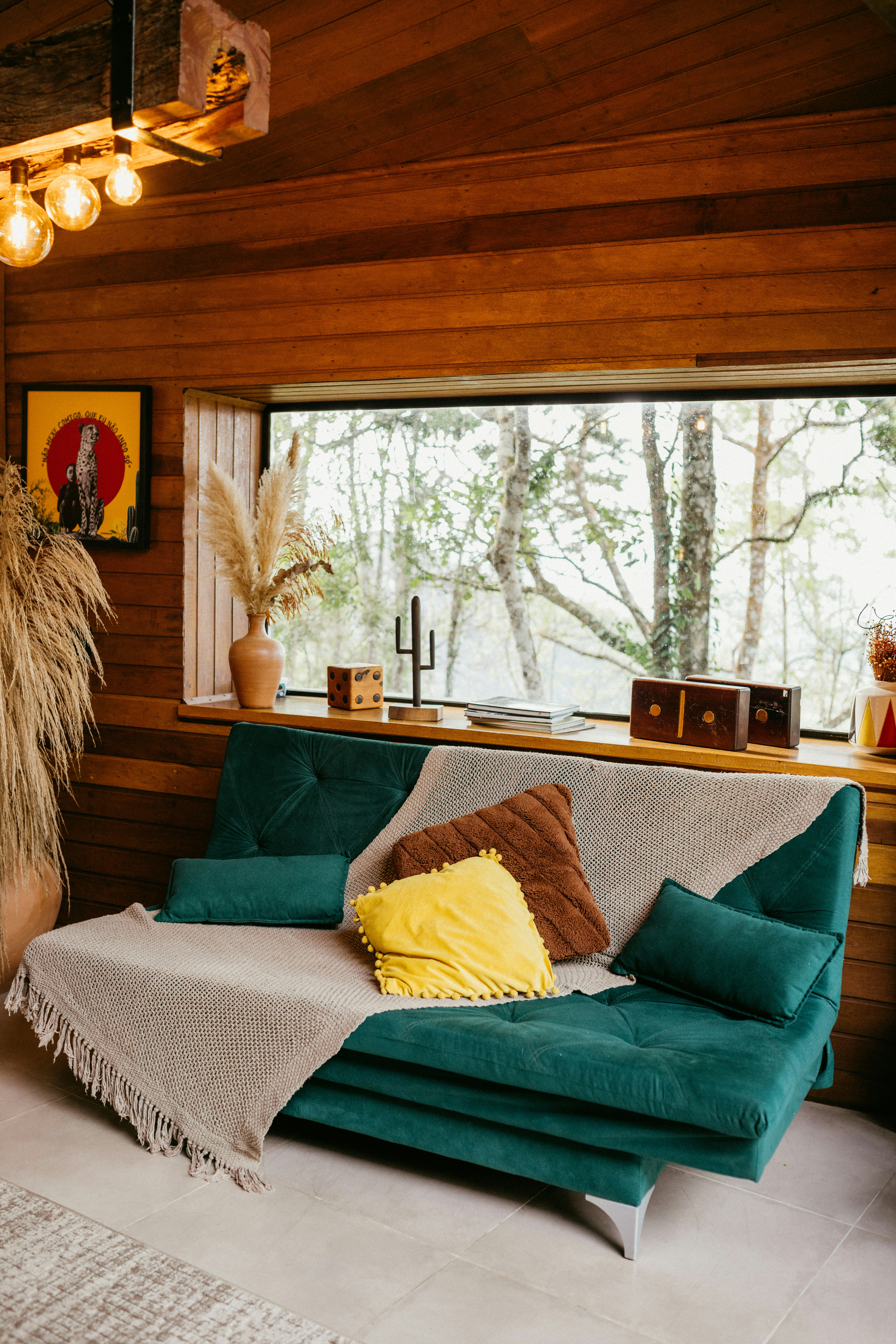 A living room filled with furniture and a large window