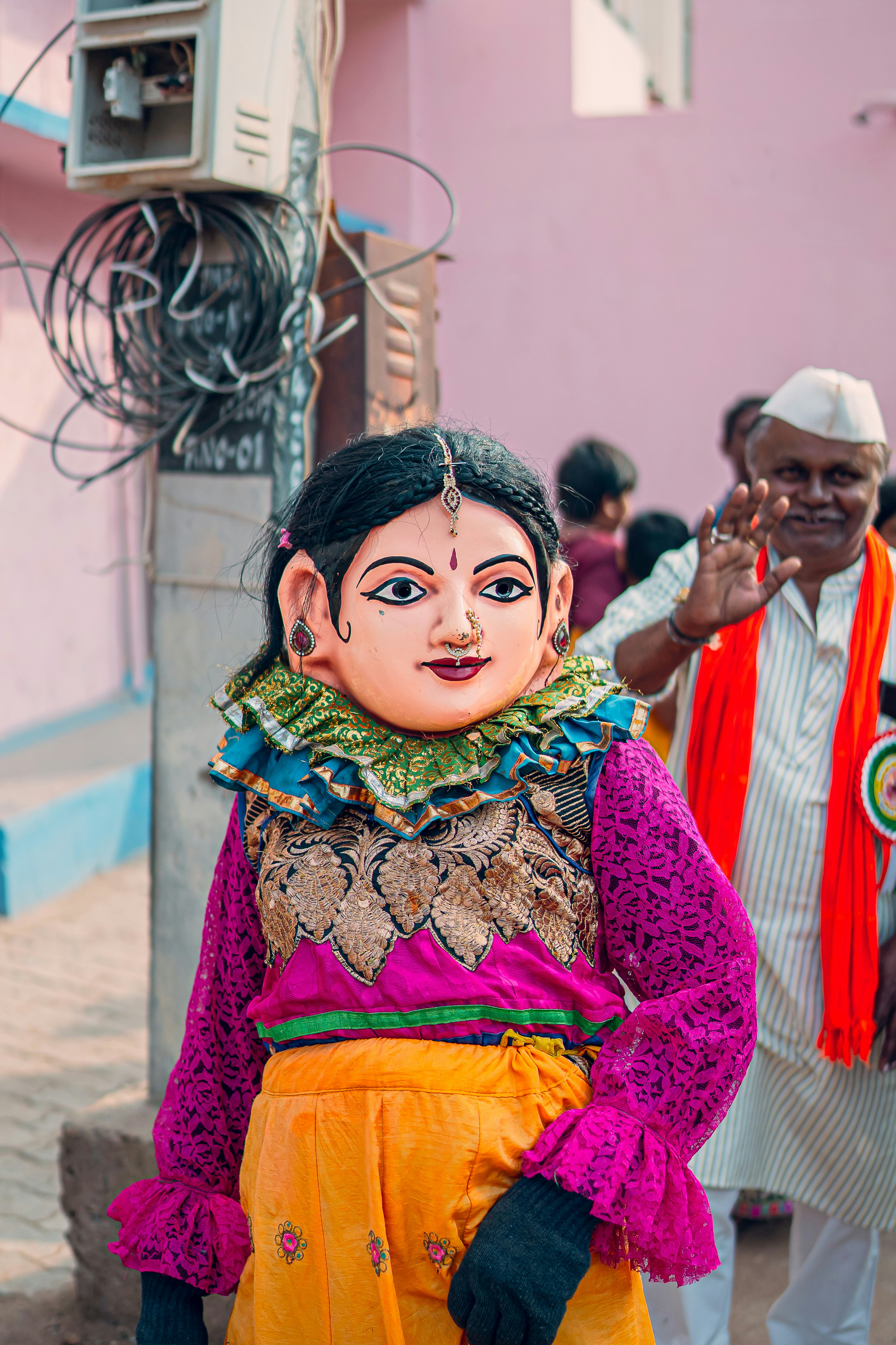 A statue of a woman in a colorful outfit
