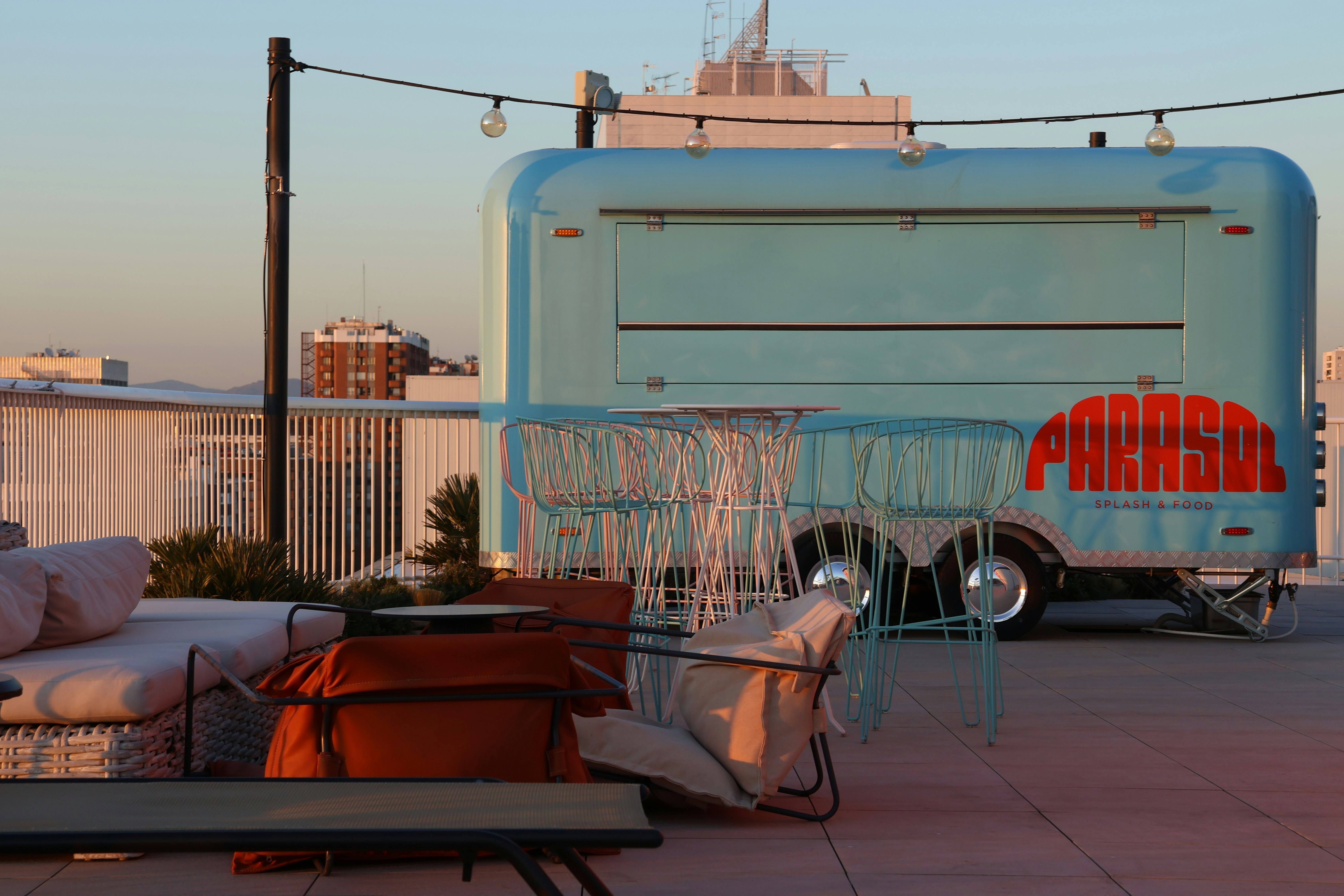 A blue trailer parked on the side of a road, slow travel