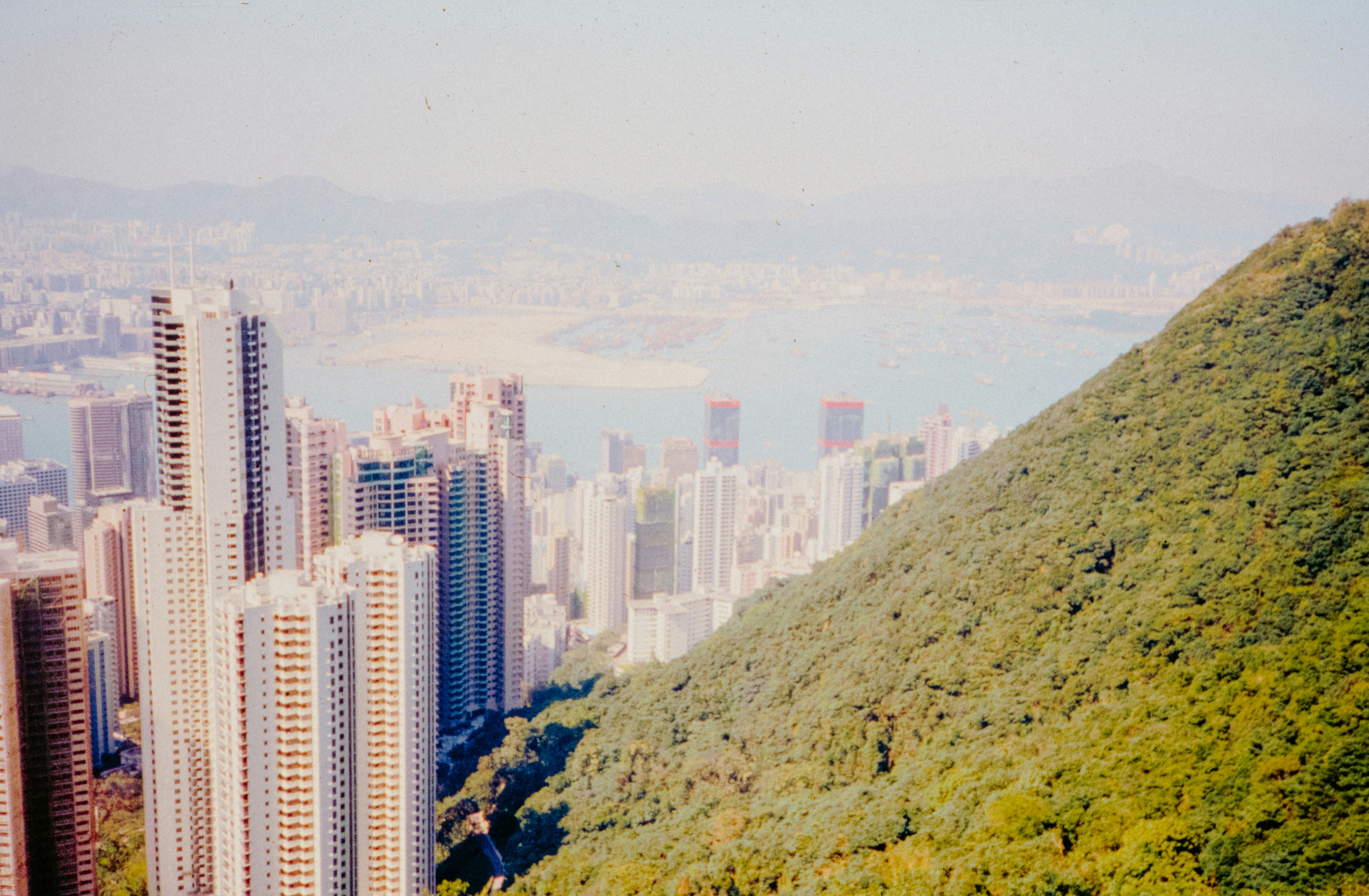 A view of a city from the top of a hill photo – Free Hong kong Image on ...