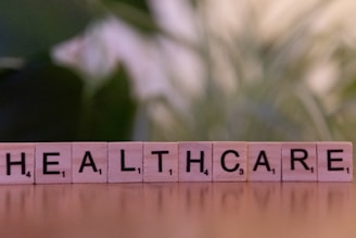 A wooden block that says healthcare on it