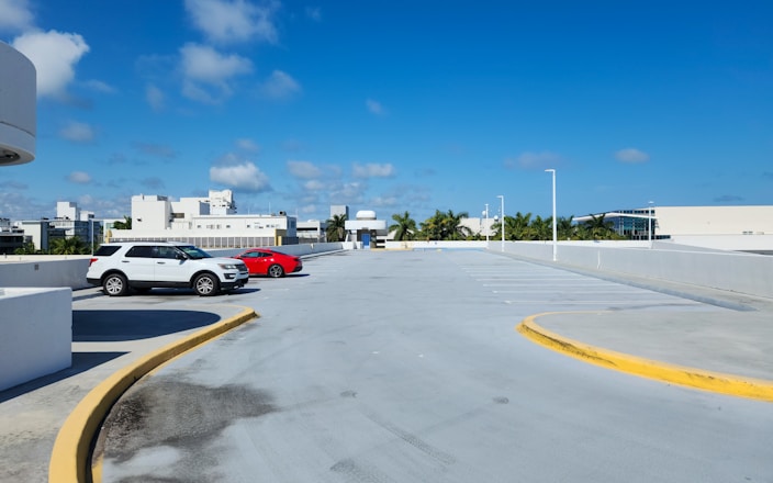 A parking lot with cars parked in it