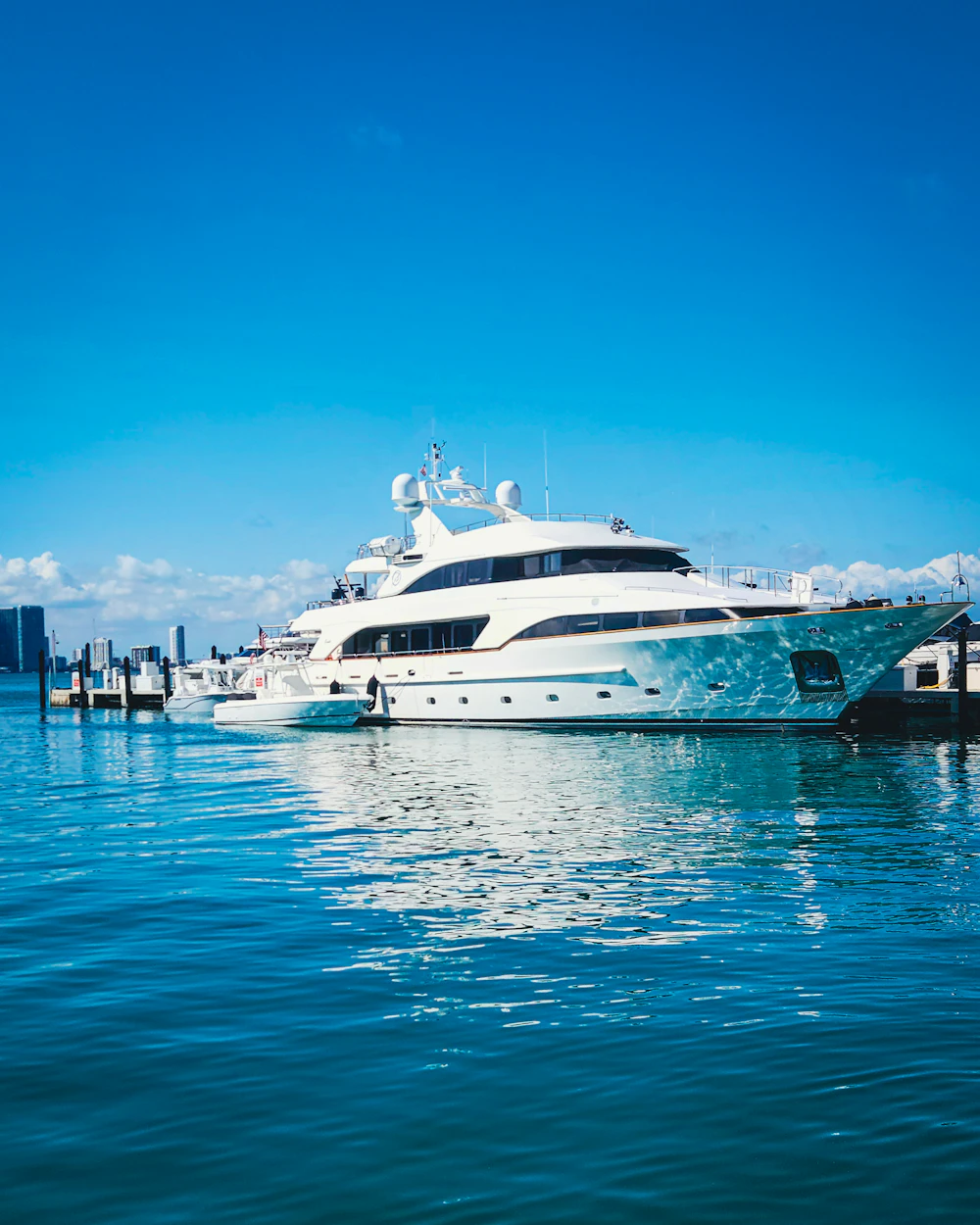 Larissa, a large white motor yacht under way at sea