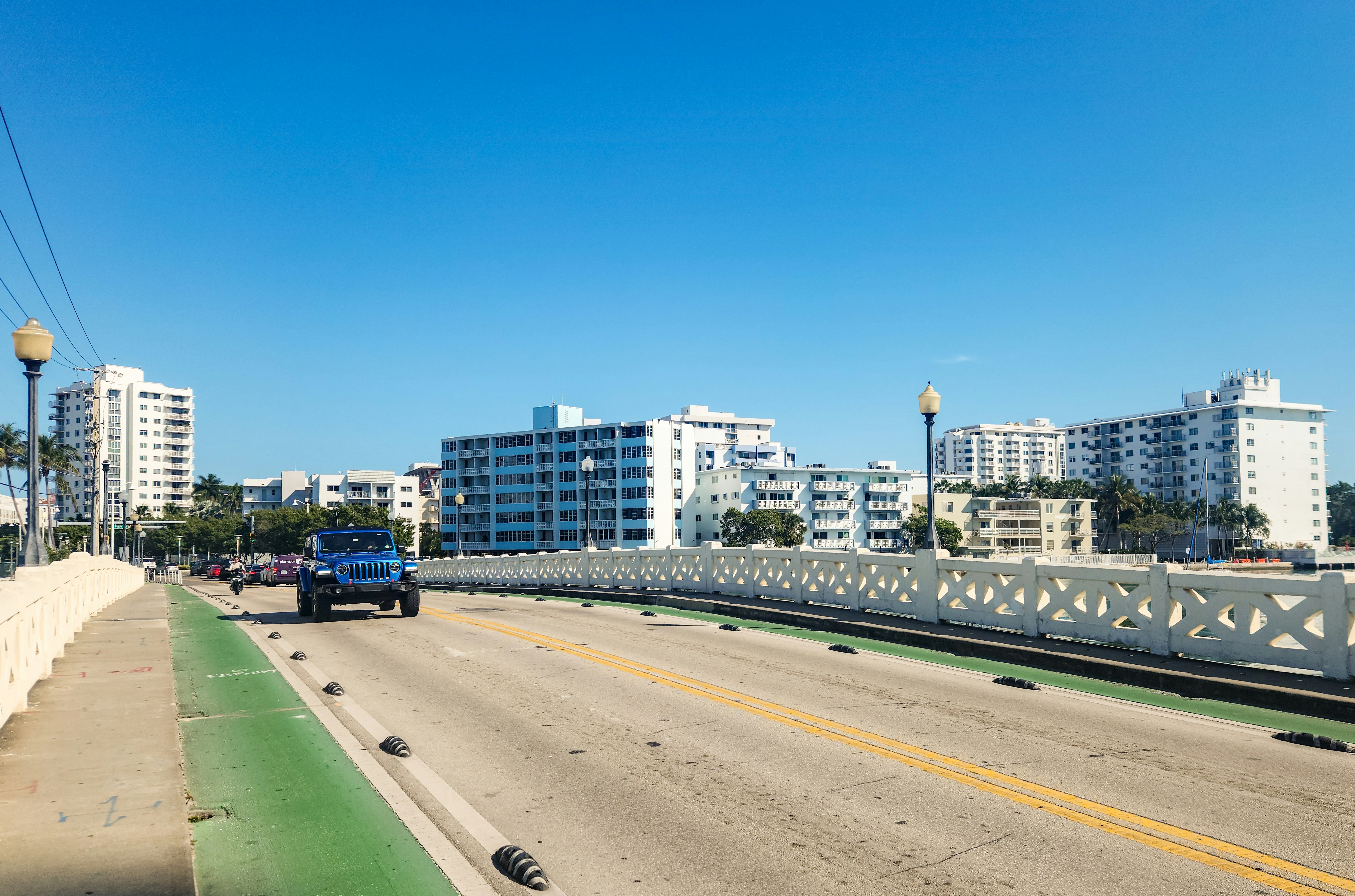 The Venetian Causeway Bridge is a scenic bridge that connects Miami Beach to the Venetian Islands, spanning across Biscayne Bay. Originally built in 1926 and later reconstructed, this historic bridge is part of the Venetian Causeway, a picturesque route linking Miami to Miami Beach. Known for its beautiful waterfront views and Art Deco-era design, the bridge is a popular route for pedestrians, cyclists, and drivers alike. It serves as a vital connection between the mainland and the exclusive island communities, offering a blend of history, functionality, and breathtaking coastal scenery.