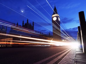 The big ben clock tower towering over the city of london