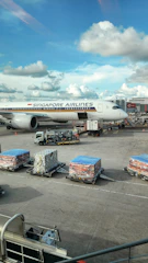 A large jetliner sitting on top of an airport tarmac