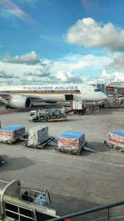 A large jetliner sitting on top of an airport tarmac