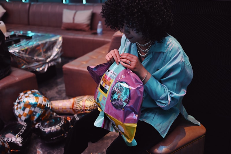 Elegant woman seated with designer backpack